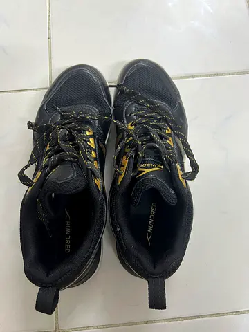 Hundred Used Black and Gold badminton Shoes