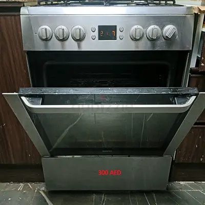GAS COOKING RANGE BEKO BRAN 4 BURNER ELECTRIC OVEN FOR SALE IN 300 DHM IN SHARJAH