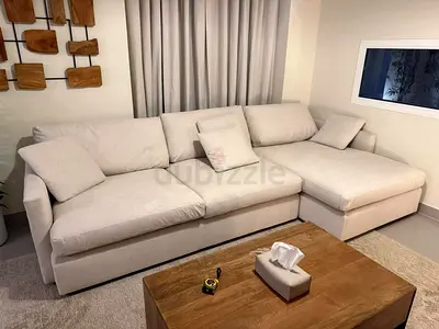 Almost great condition crate and barrel lounge deep lshape sofa beige