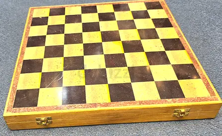 Majestic brand new pure marble chessboard 42x42  cms big with hand carved pieces inside.