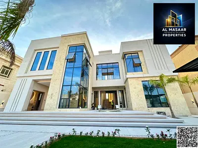 Enjoy complete privacy with this corner villa in Al Yasmin, opposite the park. It features two floors and a rooftop terrace, five master bedrooms, a s