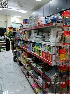 Supermarket for annual rent in Al Muwaihat 2 - Transfer includes license, 3 freezers, 2 refrigerator