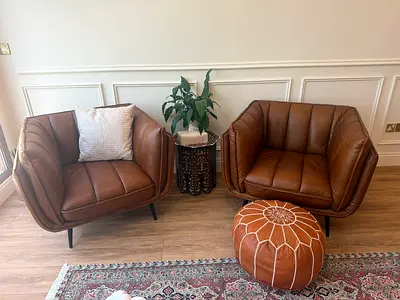 Stylish Brown Leather Armchairs (x2)