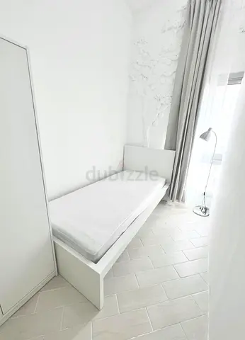 Small room for a lady in LADIES ONLY apartment in Al Barsha 1