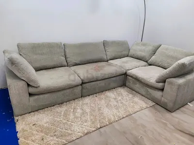 Great condition pan home feather 🪶 filled modular 4- piece Sofa