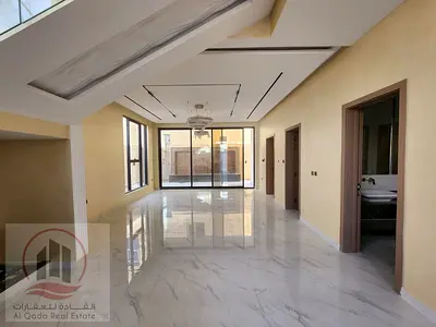 For sale, a villa in Ajman Al Helio, 5 master rooms, a Majles room, a hall, and a maid’s room, freehold for all nationalities