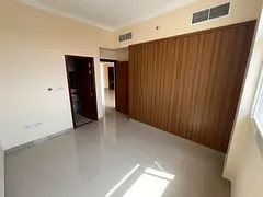 A brand-new first-occupancy apartment is available for annual rent in Al Jurf, Ajman, located