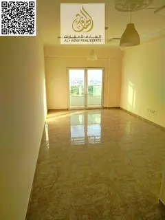 Annual rent in Ajman, Al Nuaimiya 3 area, near Dubai Islamic Bank. Two-bedroom apartment with a livi