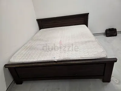 King size bed with mattress and 1 side table