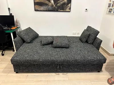 Space-Saving Sofa Bed – Perfect for small spaces, combining seating, sleeping, and storage in one sm