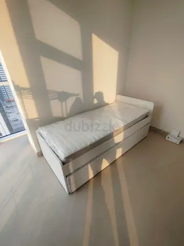 Ikea slakt bed frame with under bed and 2 storage drawers underneath with 2 Ikea mattresses