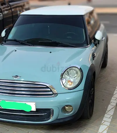 Lady driven mini Cooper
