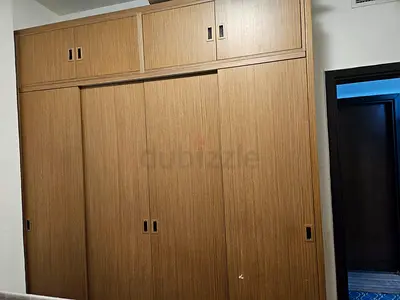 Stylish Wooden Wardrobe with Sliding Doors