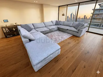 Pan Emirates pianca feather filled sofa with footstool