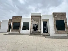 Luxury stone villa for sale in Al Qusaidat area