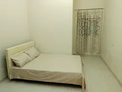Private Bedroom Available for Rent in a Premium Building.