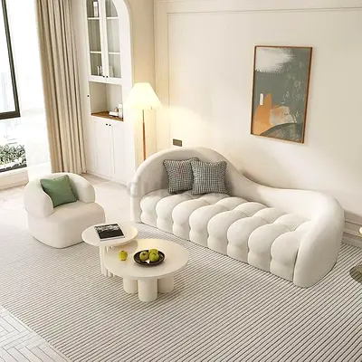 My modern curved white sofa with matching accent chair