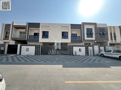 Elegant townhouse villa with a modern stone façade for sale in Al Bahia – Ajman Freehold | Bank financing or cash