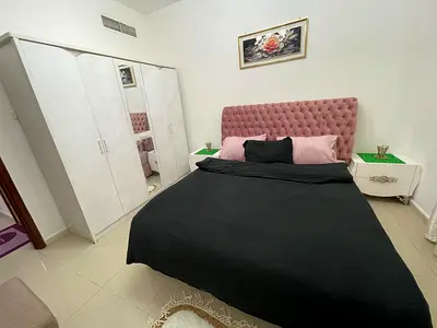 Brand-new 1-bedroom furnished apartment in Al Taawun, with balcony, open view, central AC, prime location on Dubai exit, close to all services.