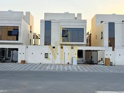 Registration fees included, near Sheikh Mohammed Bin Zayed Road - Freehold for life for all nationalities Villa for sale in Ajman, ready to move in,