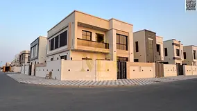 For sale: A corner villa in Al Yasmin, Ajman, featuring a modern design. The price includes registra