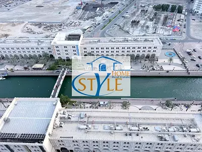 An apartment in Al Khan featuring a direct view of Al Khan Lake and another view of Al Qasba Canal.