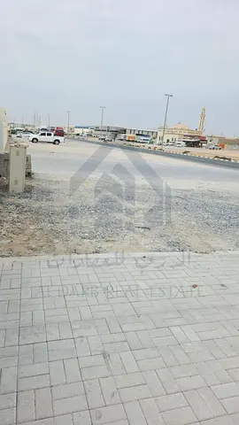 حوطة جاهزة للإيجار بالمنطقة الصناعية الصجعة بالشارقة | مسورة انترلوك | 21,000 قدم مربع | كهربا 67kw | موقع مميز