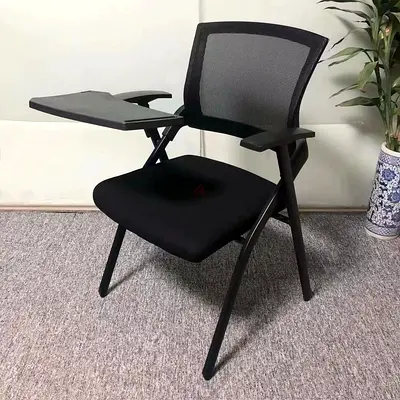 Black Folding Chair with Desk Attachment