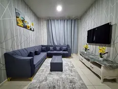 Furnished 1BR for monthly rent in Garden City Towers Ajman, all bills included, prime location near