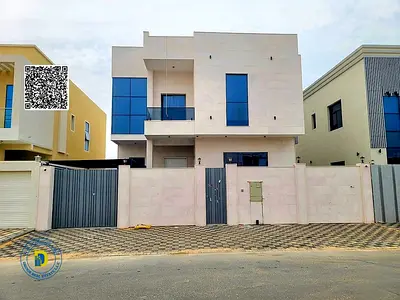 For sale: Modern villa in Al Yasmin, 5 BR with a roof, at a special price. Super deluxe finishing. Freehold. Bank financing