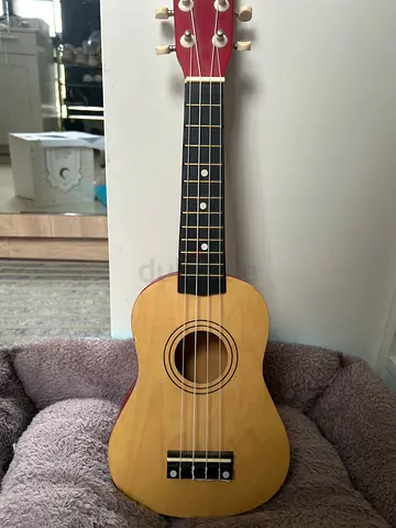 ukulele for sale — peach and red