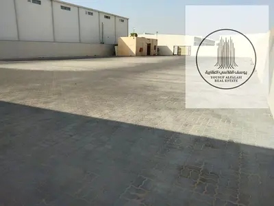 أرض مسوّرة للإيجار في الصناعية 18 الشارقة 20000 قدم²