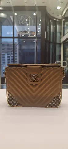 Quilted brown chain-strap handbag - gently used