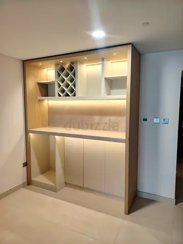 We do all Carpentery work Custome TV Unit and bed and Cabinet and kitchen work and wooden doors etc.