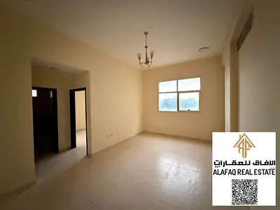 شقة غرفتين وصالة للإيجار في الجرف 1 بعجمان حمامين تكييف مركزي مساحات واسعة موقع مميز بجانب شارع عمار وقريب من المدارس