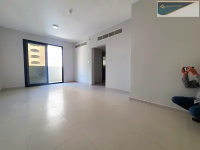HOT OFFER !! FULLY SPACIOUS BRAND NEW BUILDING 1BHK APARTMENT WITH 1 CAR PARKING AND BALCONY CENTRALIZED AC AND GAS JUST 39K ABU SHAGARA