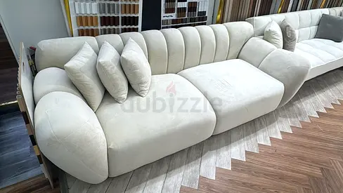 Stylish Beige Upholstered Sofa with Cushions