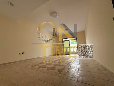 Apartment with separate majlis, spacious layout, and free central gas in a family-friendly building, ideal for comfortable and private living