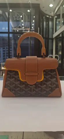 Brown patterned canvas  leather top-handle womens handbag - gently used