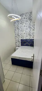 Fully furnished partition room available for single or couple near the gardens metro station
