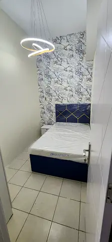 Fully furnished partition room available for single or couple near the gardens metro station