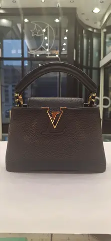 Black pebbled leather top-handle handbag with gold hardware - gently used