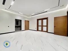 For sale: Modern villa with 5BR and a roof terrace, including registration fees, in Al Bahia ,freeho