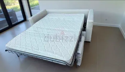 Natuzzi two seater sofa bed with mattress