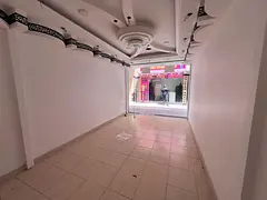 Shops for annual rent – ​​Al Hamidiya 1, Ajman, near the court, inside a commercial complex