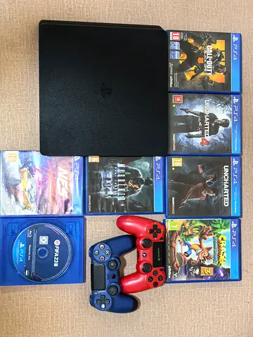 PS4 Slim 1 TB with 7 Games + 2 DualShock Controllers