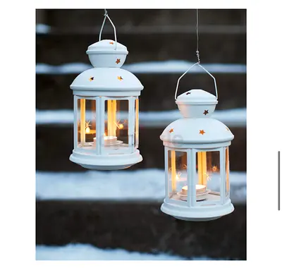 Pair of white hanging candle lanterns — indoor/outdoor decorative lamps
