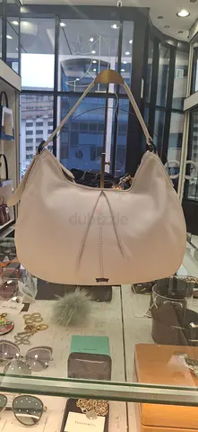 Gently used light grey leather hobo shoulder bag