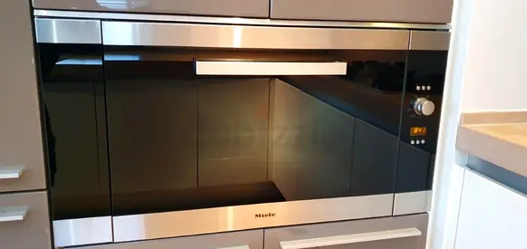 Latest model Miele built in electric oven 90 by 60cm