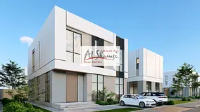 A villa in Al Ruqaybah area, Sharjah, under construction, with flexible payment plans.